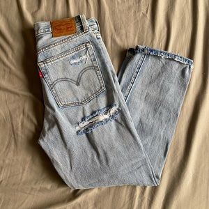 Levi’s Light Washed Button-fly Distressed Jeans